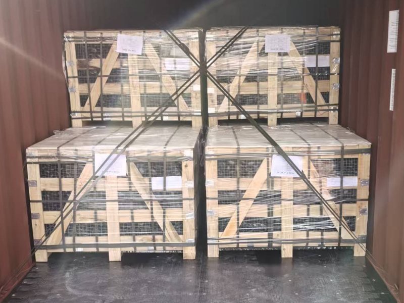 Decorative stone crates secured inside a shipping container