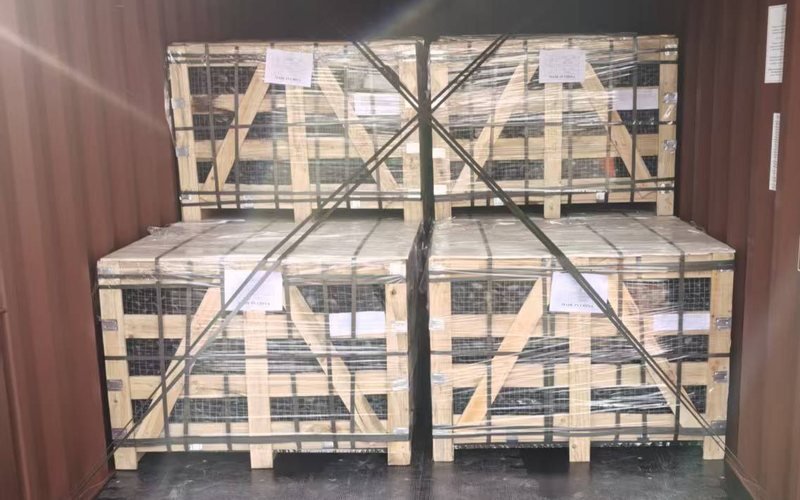 Decorative stone crates secured inside a shipping container