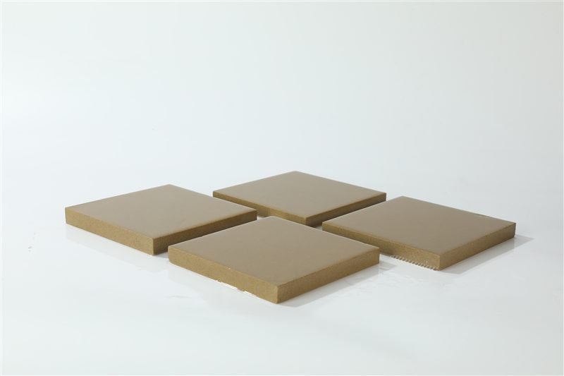 Dark beige smooth ashlar tiles showing surface texture