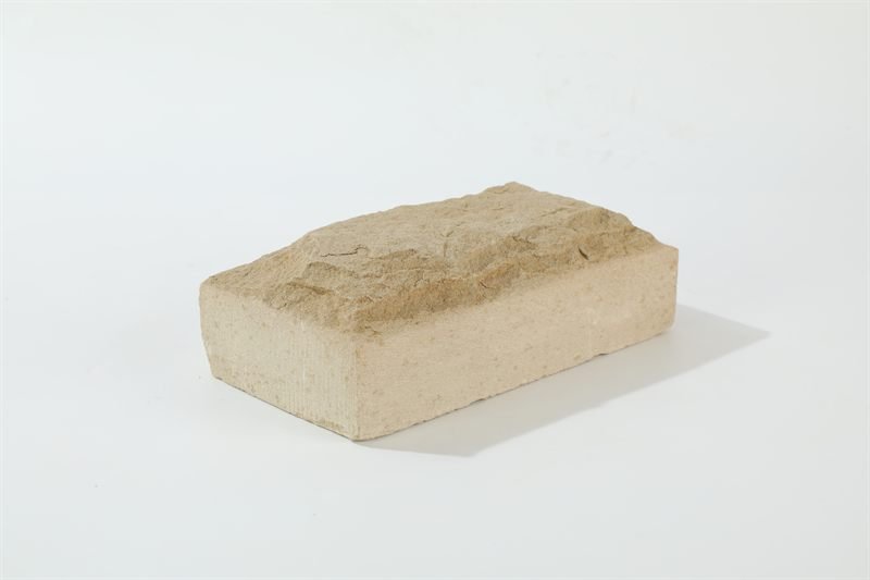 Beige sandstone bricks — mushroom face showing natural colour and shape variation