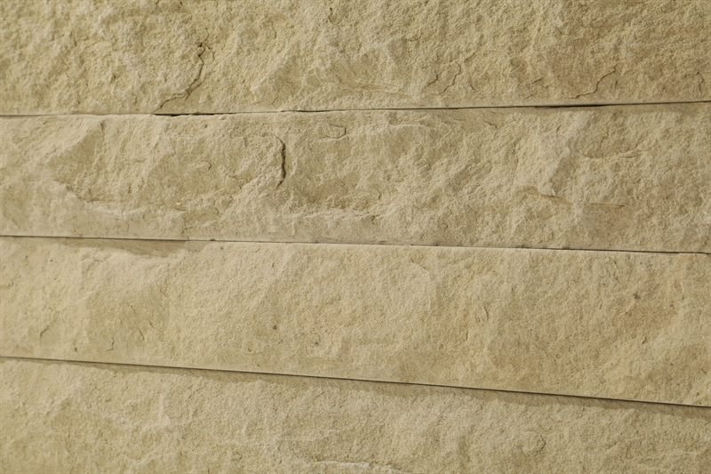 Beige sandstone walling — natural face showing surface texture