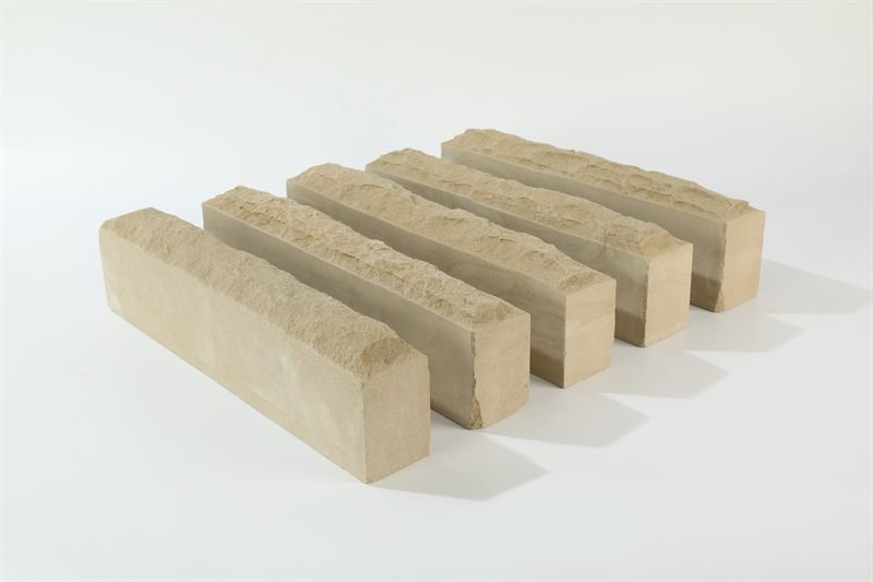 Beige sandstone walling — mushroom face shown in closer detail