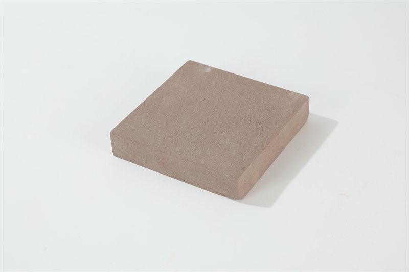 A loose quantity of red sandstone tiles