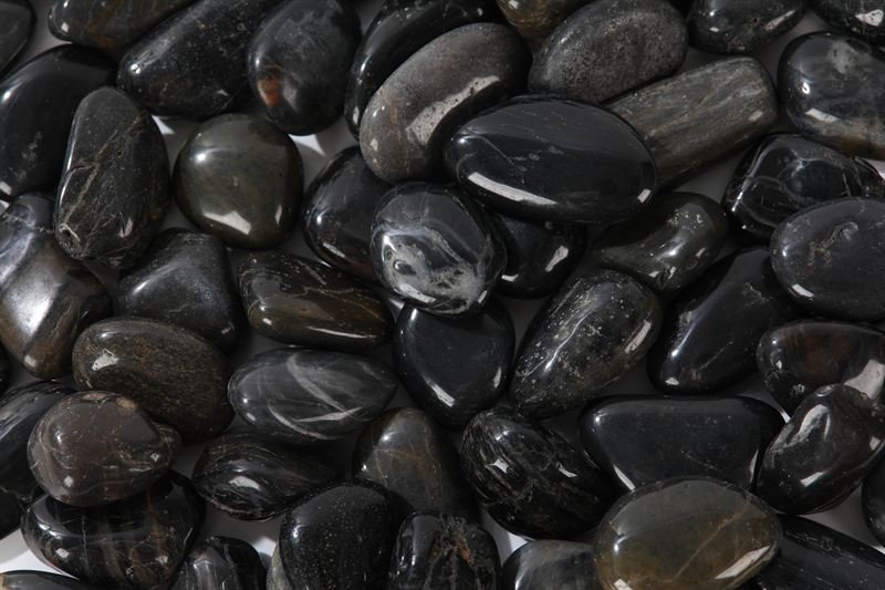 Additional view of natural black polished pebbles