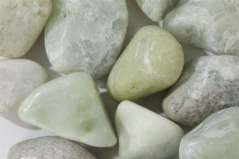 Jade pebbles in 30–60mm showing natural shape variation