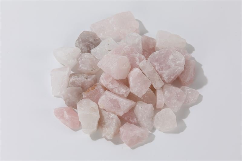 Rose quartz in 10–35mm showing natural shape variation