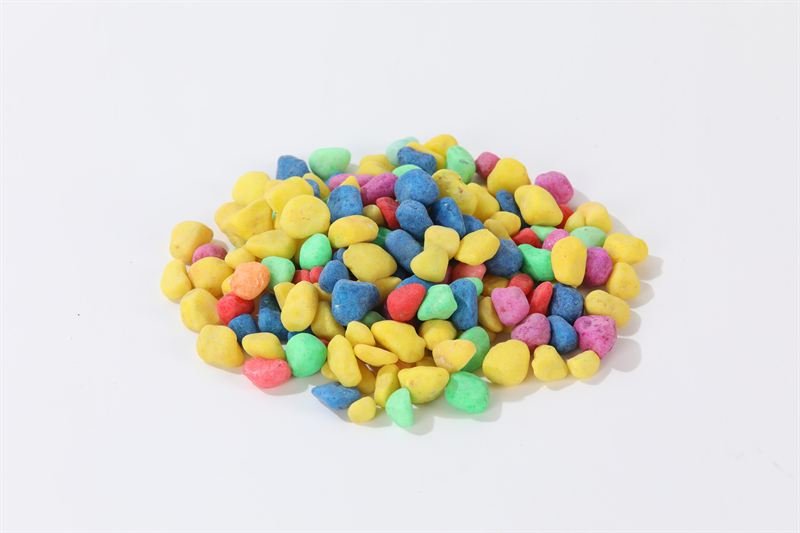 Dyed coloured gravel showing natural colour and shape variation