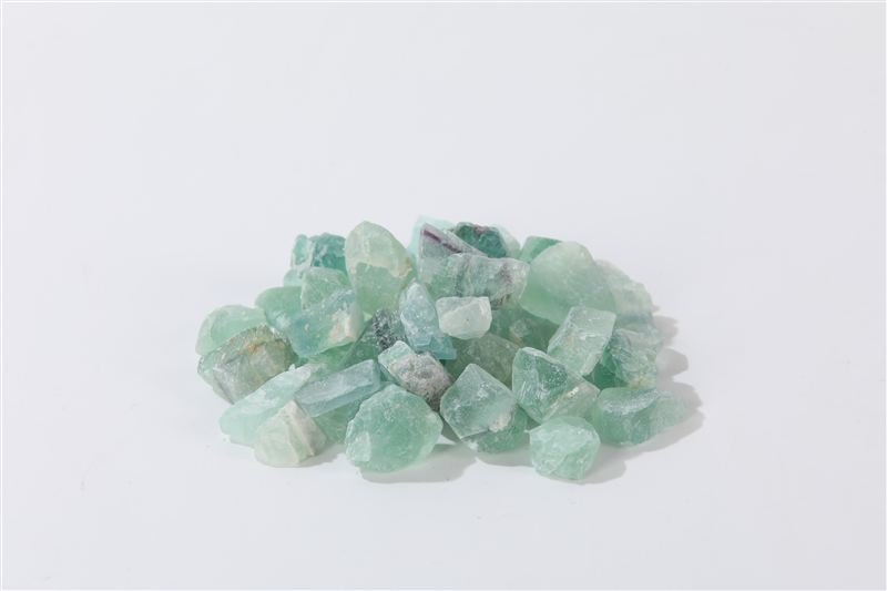 Green fluorite in 10–30mm showing natural shape variation