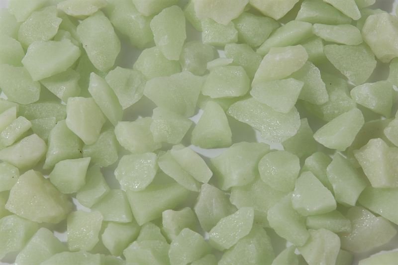 Mint jade chips in 10–15mm showing natural shape variation