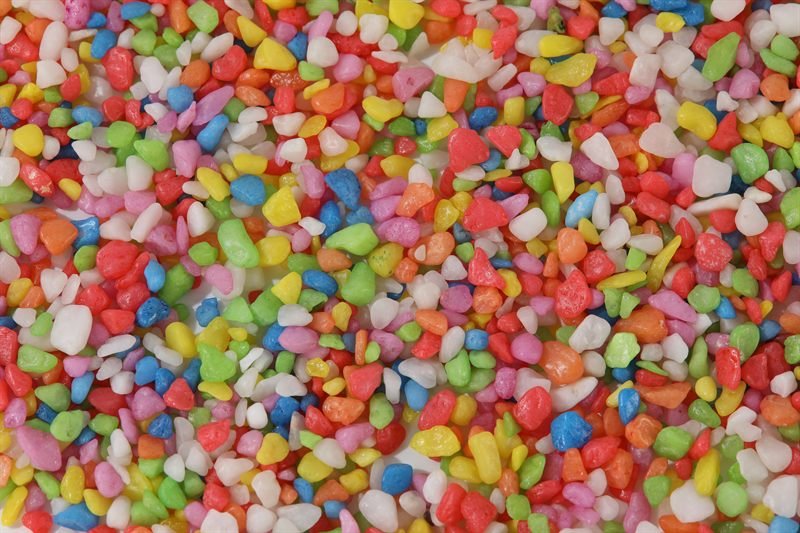 Dyed coloured gravel in 5–10mm showing natural shape variation