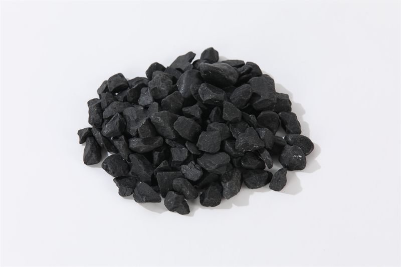 Coal black crushed aggregate in 12–20mm showing natural shape variation