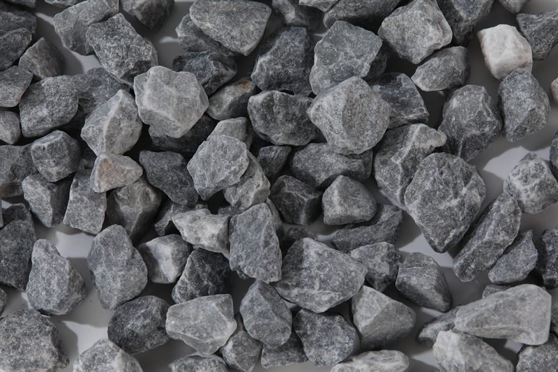 Close-up of dark grey crushed aggregate in 15–25mm
