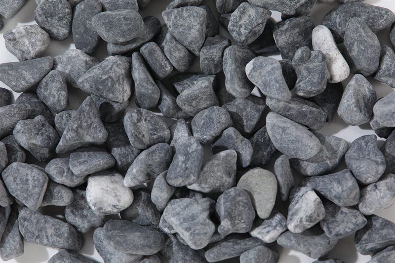 Close-up of dark grey crushed aggregate in 10–20mm