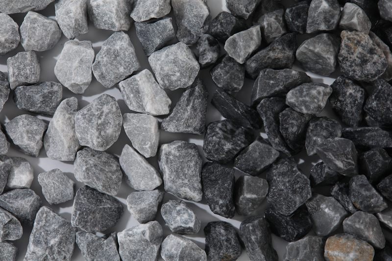 Dark grey crushed aggregate in 15–25mm showing natural shape variation