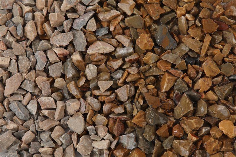 Floor yellow crushed aggregate in 10–15mm showing natural shape variation