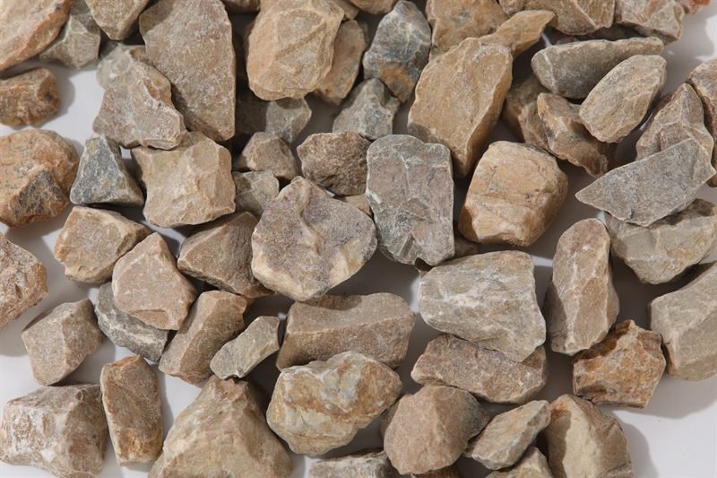Floor yellow crushed aggregate in 10–25mm showing natural shape variation