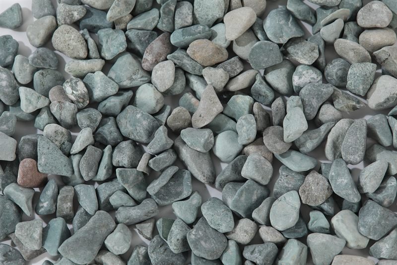 Green rounded gravel in 5–15mm showing natural shape variation