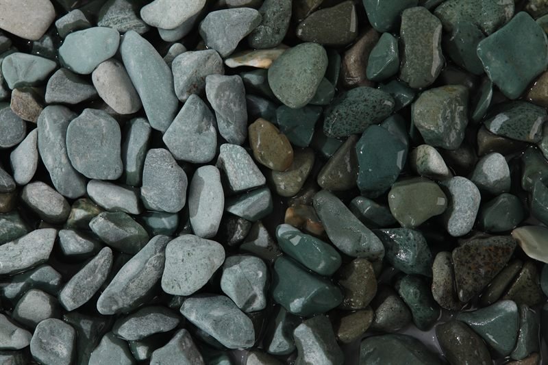 Green rounded gravel in 15–25mm showing natural shape variation