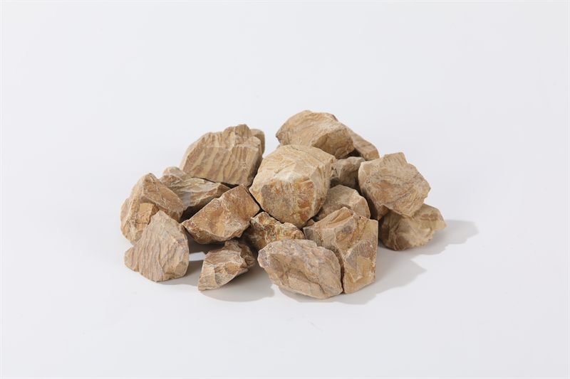 Yellow mountain rock in 30–50mm showing natural shape variation