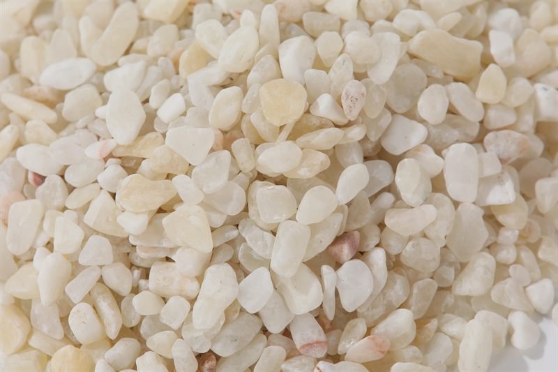Rice white rounded gravel in 5–10mm showing natural shape variation