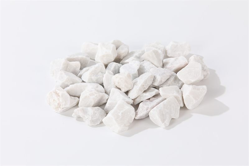 White crushed aggregate in 25–45mm showing natural shape variation