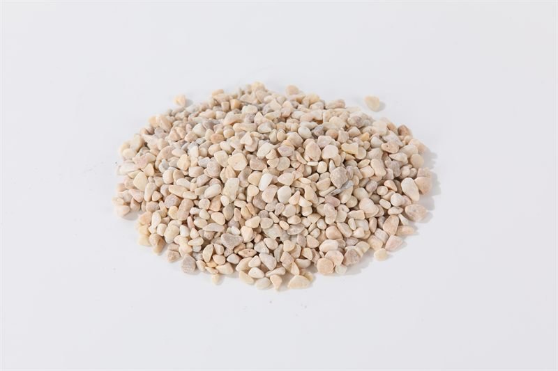Light yellow rounded gravel in 5–10mm showing natural shape variation