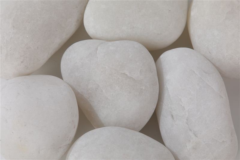 Ivory white pebbles in 50–80mm showing natural shape variation