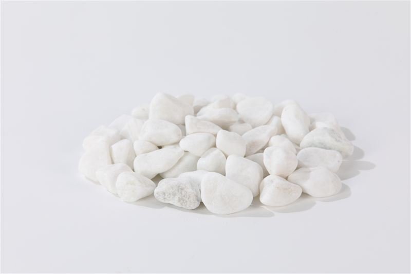 Snow white pebbles in 10–20mm showing natural shape variation