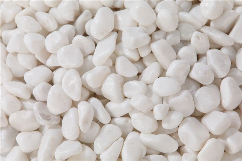 Snow white high polished mini pebbles in 9–12mm showing natural shape variation