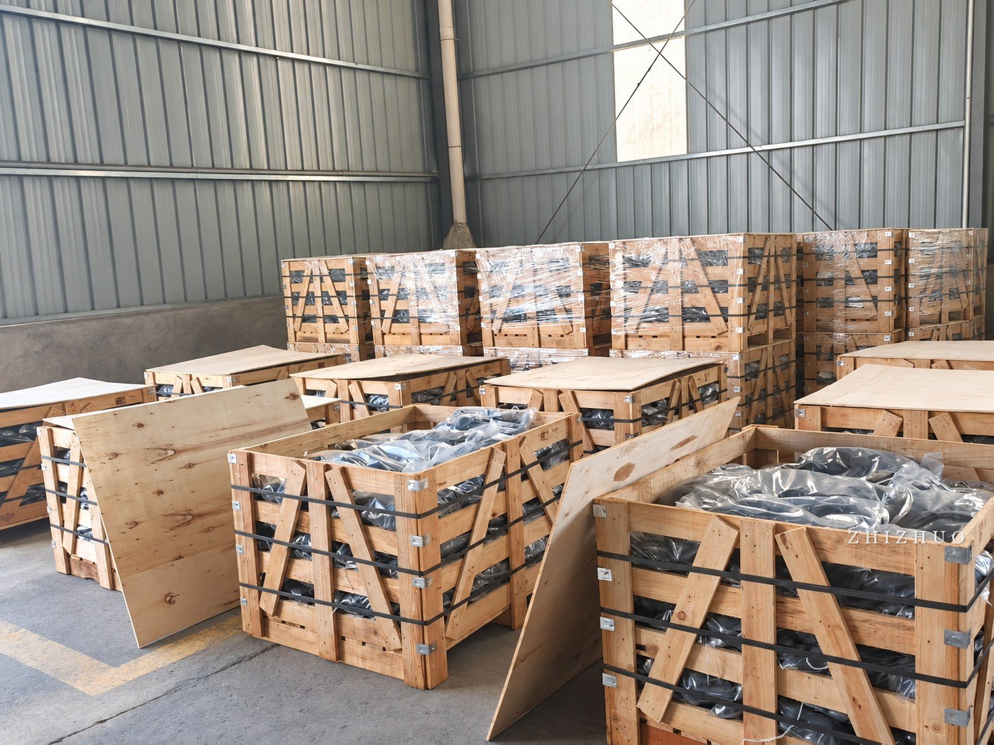 Wooden export crates containing decorative stone prepared for international shipping